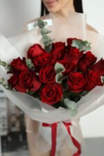 Bouquet of 15 red Explorer roses and eucalyptus