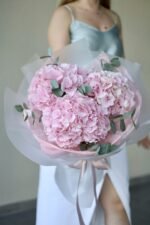 Monobouquet of pink hydrangea with eucalyptus