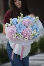 Bouquet with blue and pink hydrangeas and eustoma