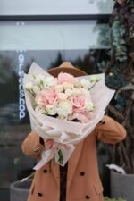 White and pink bouquet with inverted roses