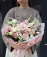 White and pink bouquet with roses, eustoma